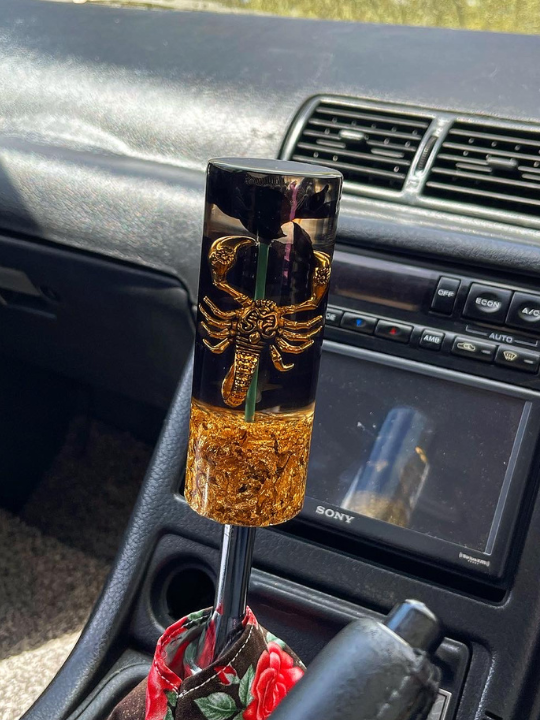 gold scorpion, black flowers and a gold flake base Custom Shift