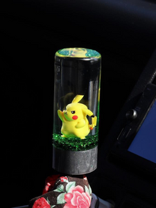 Pikachu figure, green grass and Custom Shift