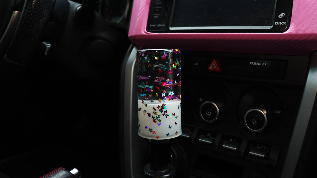 Multi-colored butterfly glitter with a white base